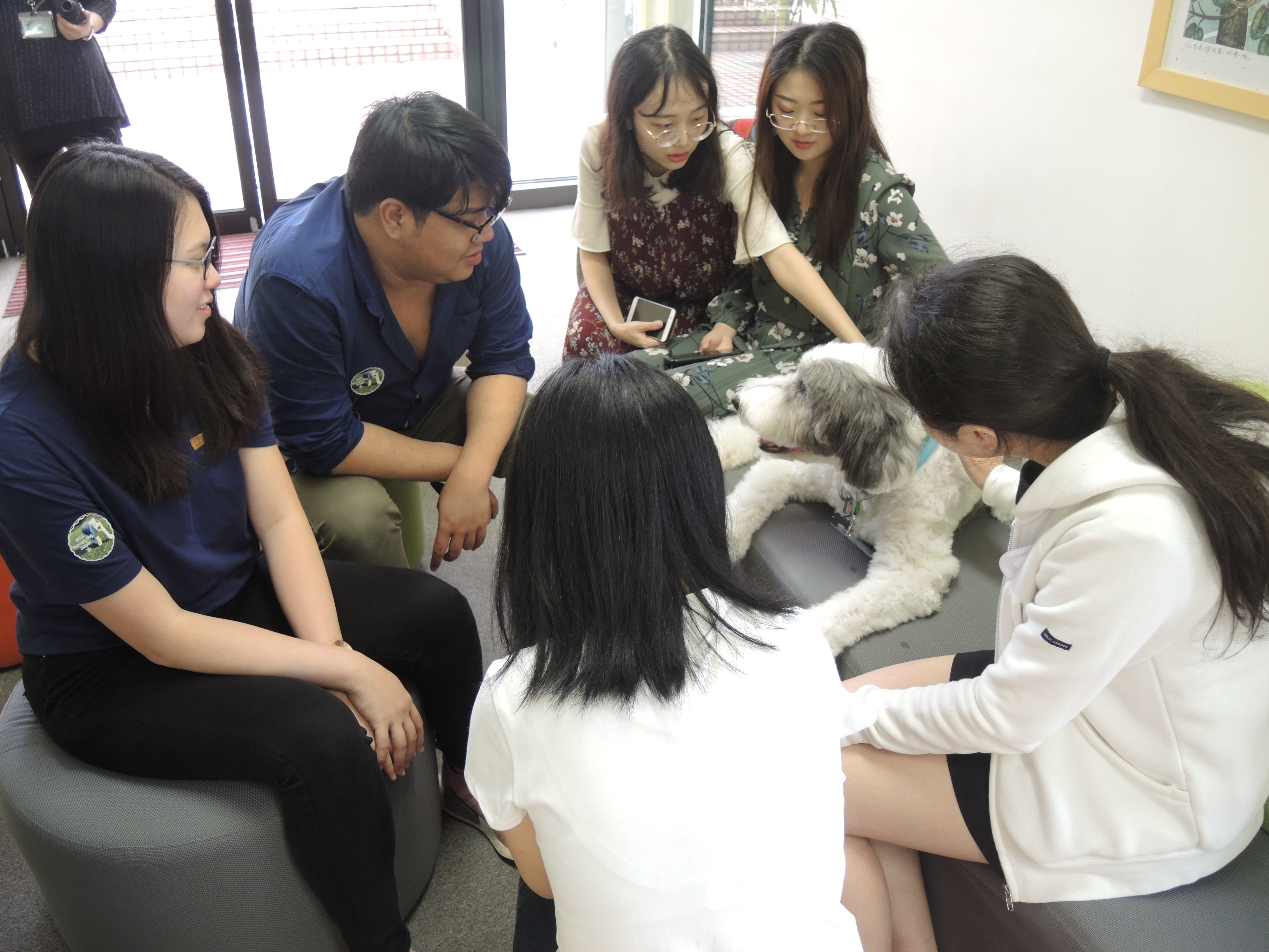 Six people and a dog.