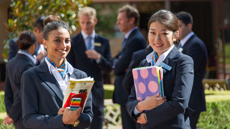 BMIHMS holding textbooks