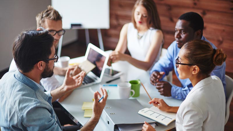 People having a business meeting at a table